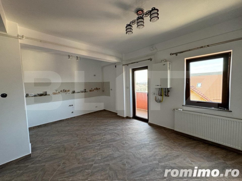 Apartament 3 camere, 100mp, situat pe 2 niveluri, zona Radauti