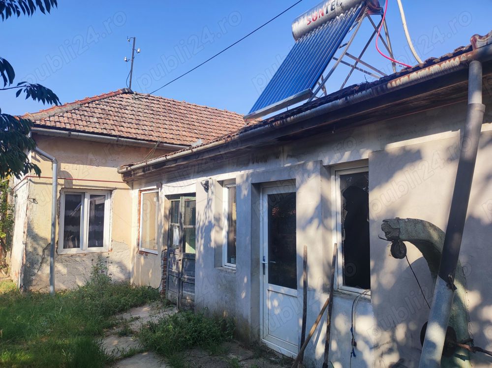 Vand sau schimb casa la curte comuna