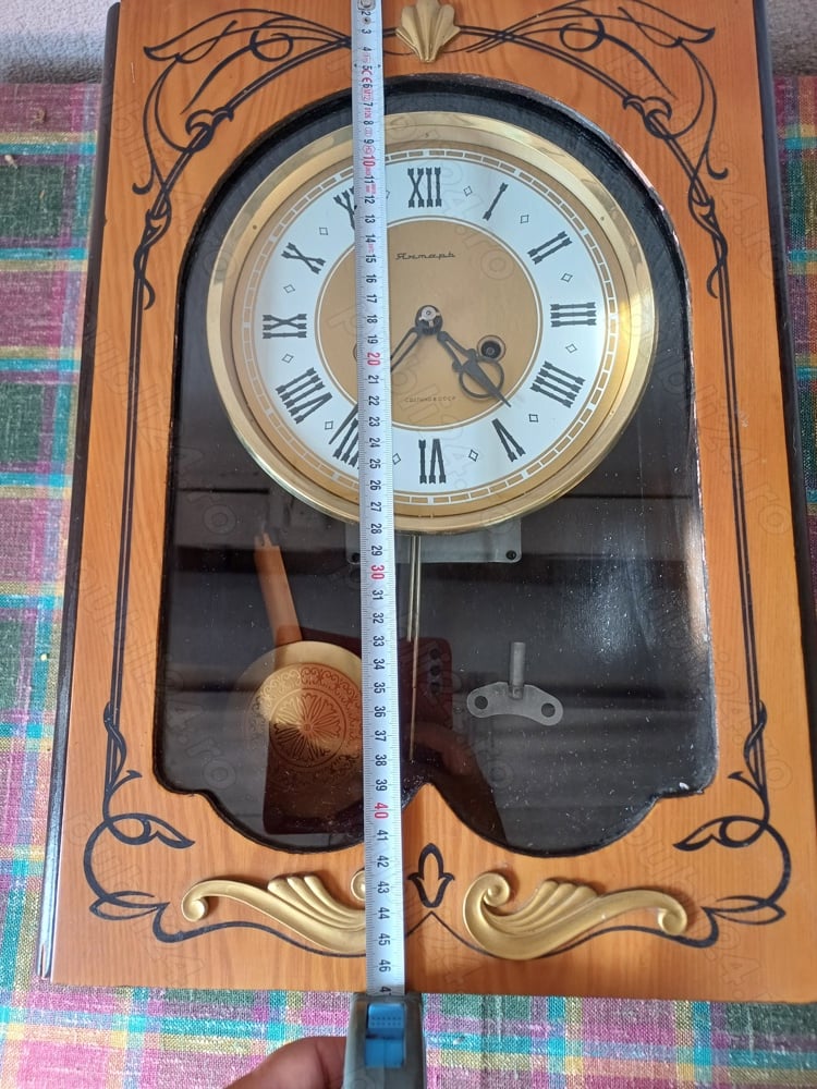 Ceas cu pendul si cheie