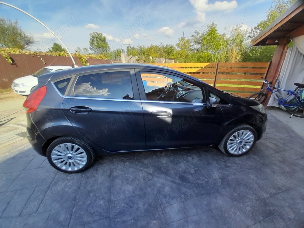 De vinzare ford fiesta an 2009