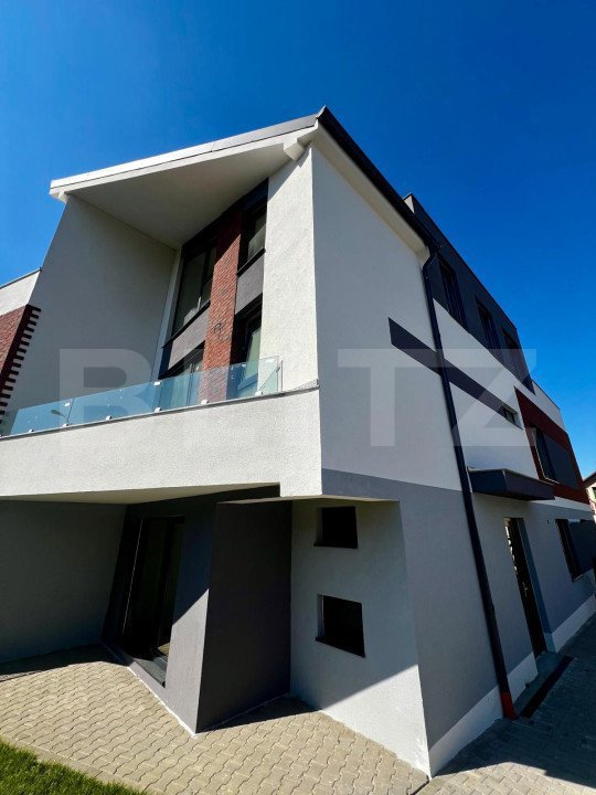 Casa tip duplex cu o arhitectura moderna, la doar 10 minute de centrul orasului!