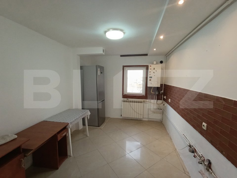  Apartament spațios de vânzare - 4 camere, 2 băi, 2 balcoane, loc de parcare 