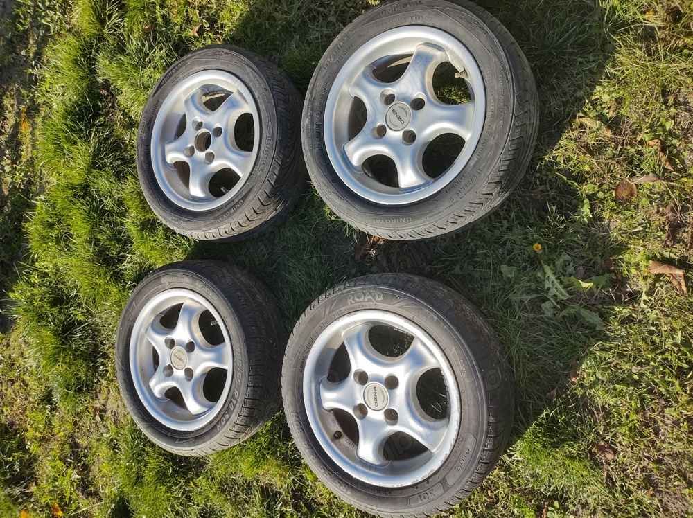 Jante aluminiu 14" cu anvelope Uniroyal și Sebring