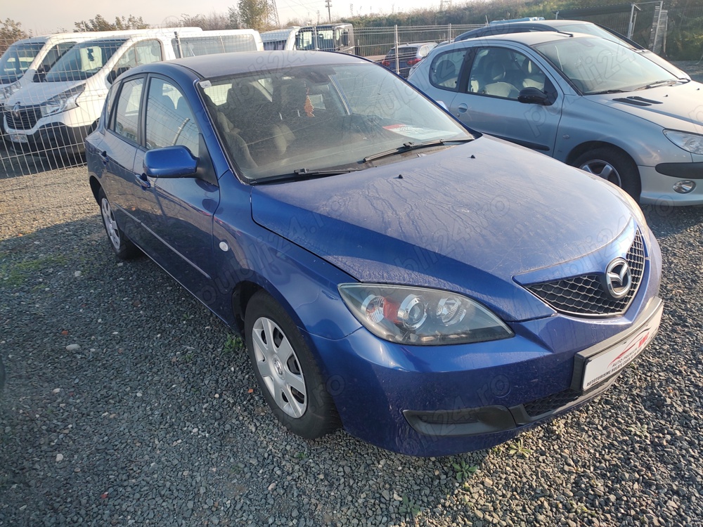 Mazda 3 an 2007 14 benzină