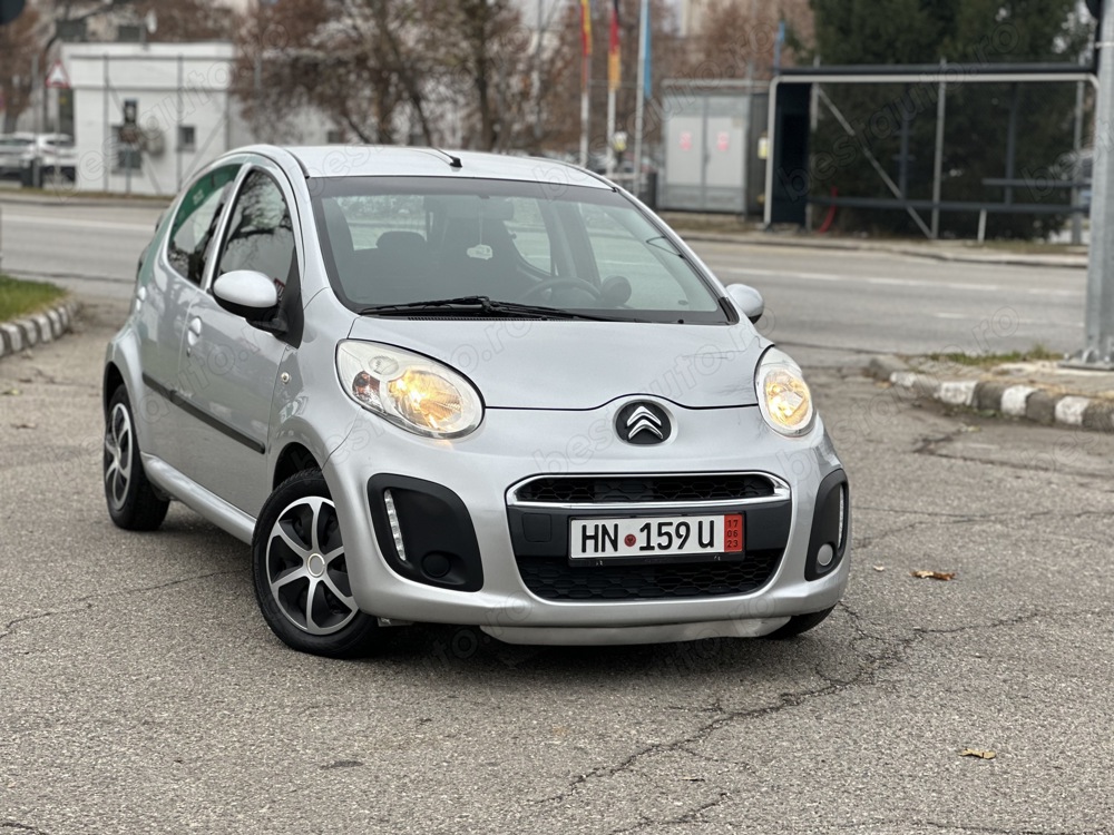 Citroen C1*lumini de zi led*benzina*4 usi*clima*euro 5*af.2013 luna 03