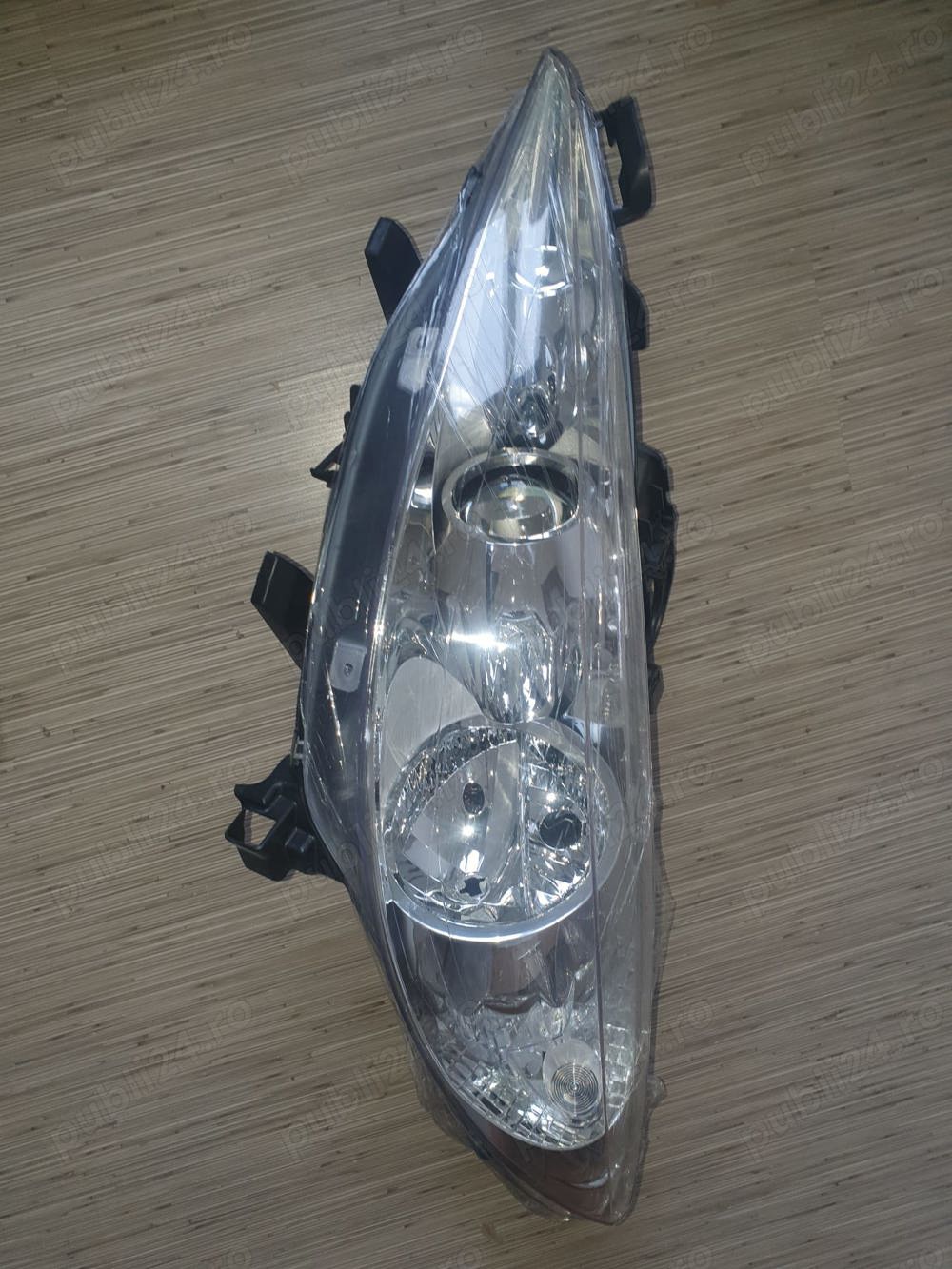 Far stanga Peugeot 207