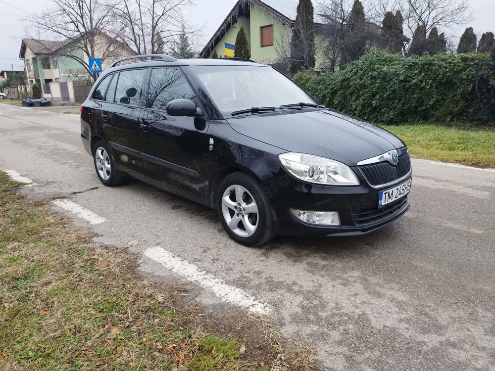 Skoda Fabia 1,2 TDI cu 75cp, an 2011, climatronic, piele, incalzire scaune