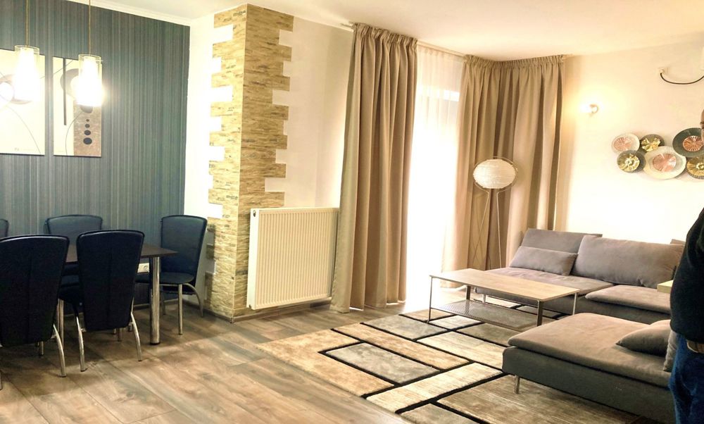 Apartament pe doua nivele in vila cu garaj si teren in folosinta