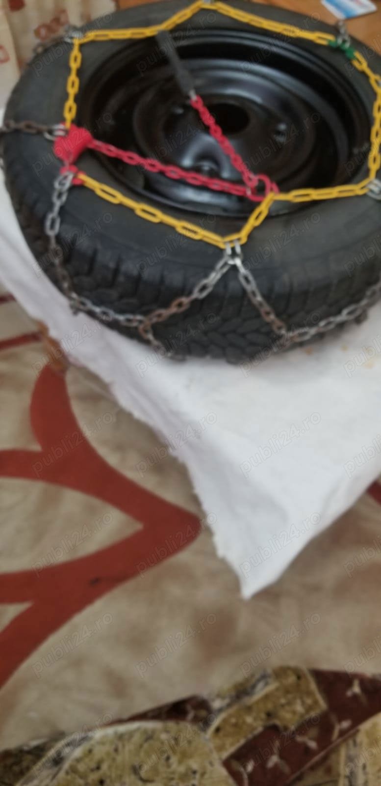 Vand  2 roti Dacia 1310 cu cauciucuri  iarna vara cu lanturi.