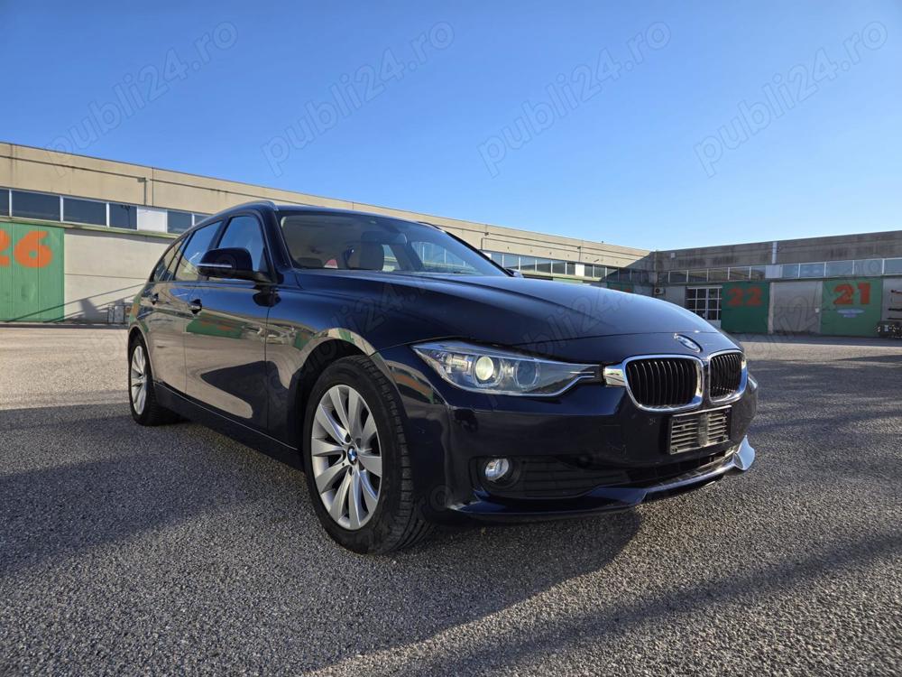 Bmw 3 Series 320d X drive 4x4 la pret promotional