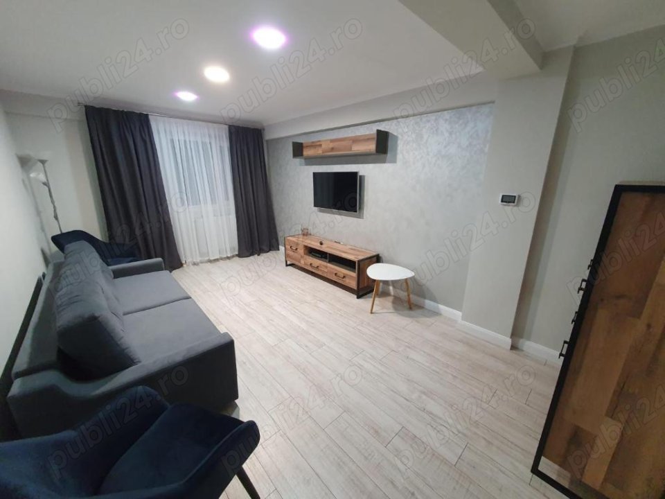 Apartament doua camere decomandat etaj patru zona 0, renovat elegant, mobilat, la cheie afacere buna