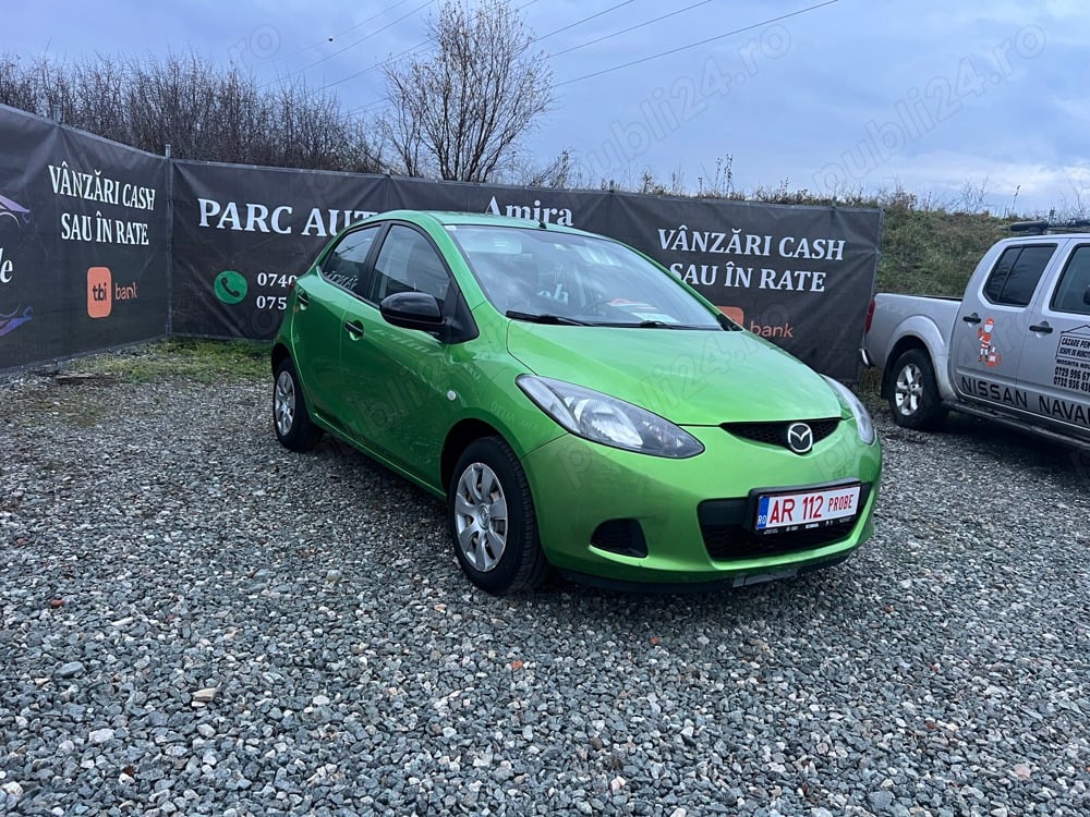 Mazda 2,1.4 diesel, an 2009, clima