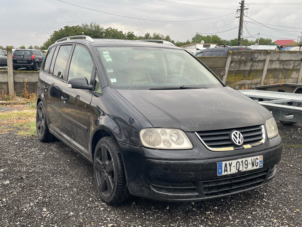 Vand sau Schimb volkswagen touran 7 Locuri 2.0 tdi 140cp e4 a.f.2005 6 viteze acte Franta 2026