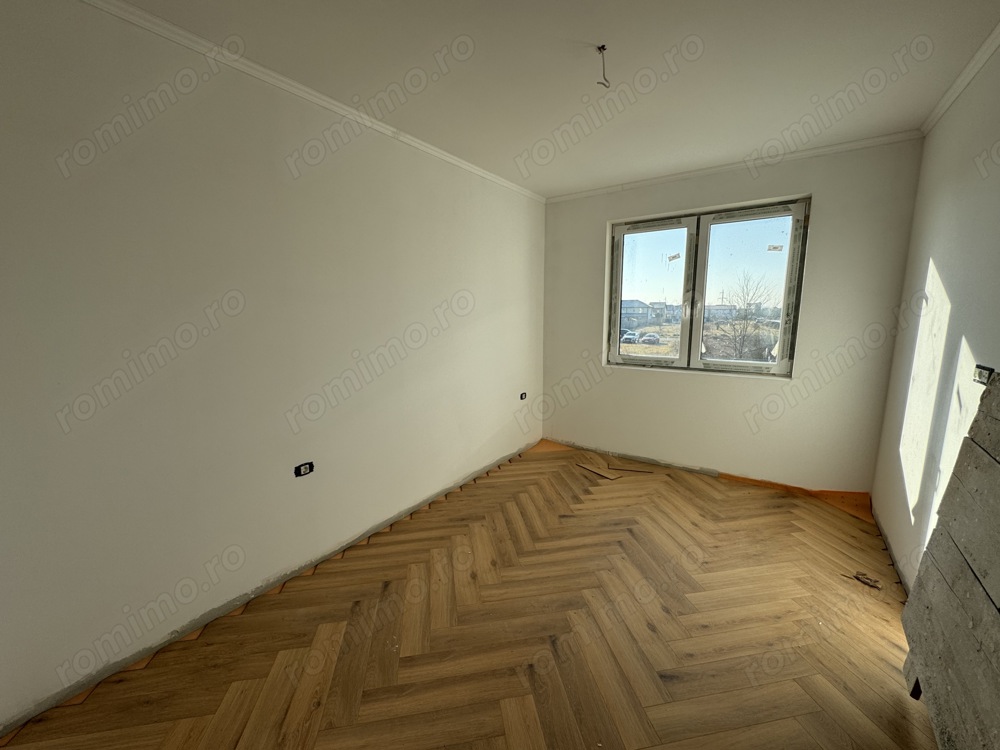 Duplex cu 5 camere si 3 bai finisat la cheie in Dumbravita 