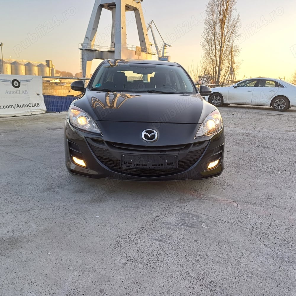 Mazda 3 1.6 benzina 105 cai ,clima,pilot incalzire , 176.000 km ,Import Germania ,