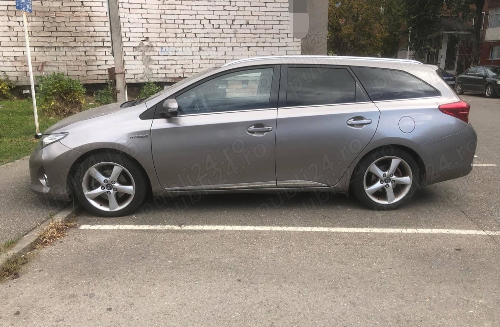 Toyota auris hybrid combi impecabila