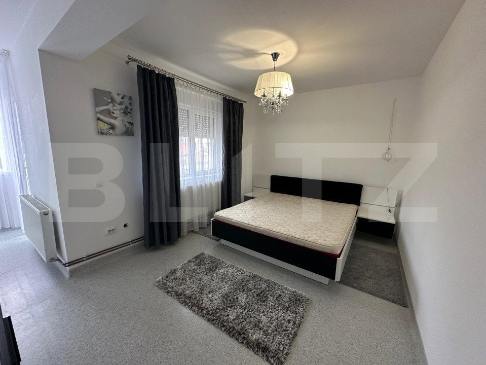 Apartament de Inchiriat 3 camere, 2 dormitoare, 2 bai,1 loc de parcare, dressing