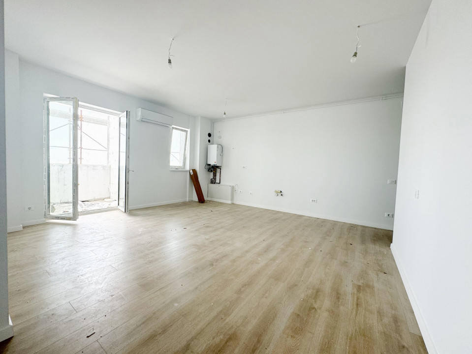 Apartament 3 camere, open space, 67 mp utili, etaj 6/9,  zona Aradului