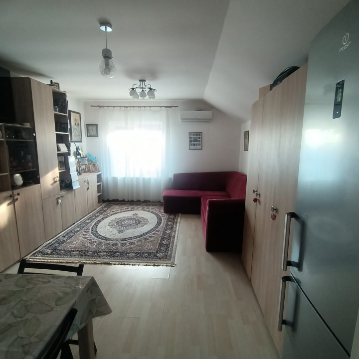 Apartament+pod mansardabil