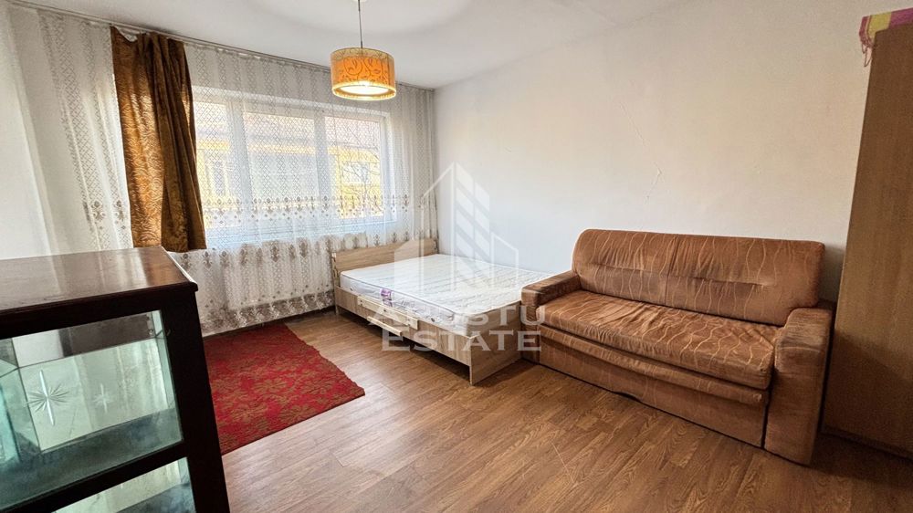 Apartament cu o camera, decomandat, etaj intermediar, zona Buziasului