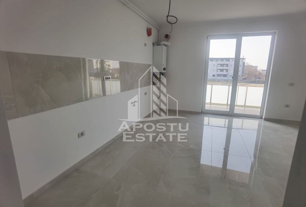 Apartament cu 1 camera tip studio, la parter cu balcon, finalizat.