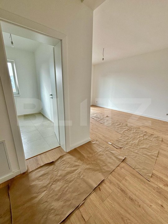 Apartament luminos, Etaj 1, 53 mp plus terasa 7,5 mp loc de parcare