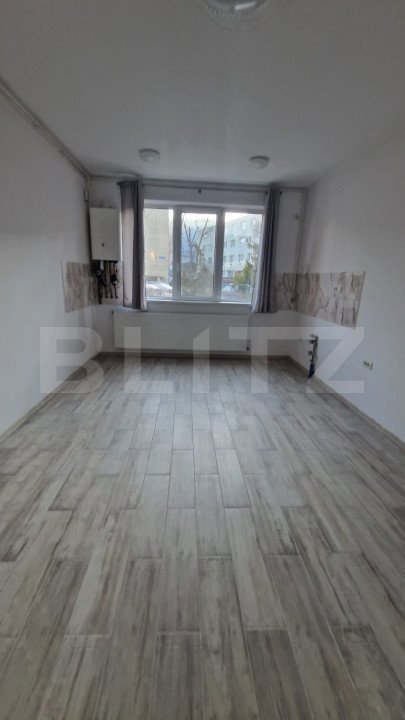 Garsoniera in Noua , renovata complect cu centrala si gradina