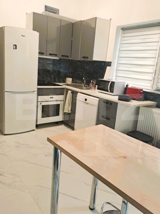 Casa cu 2 apartamente la curte comuna, pt investitie