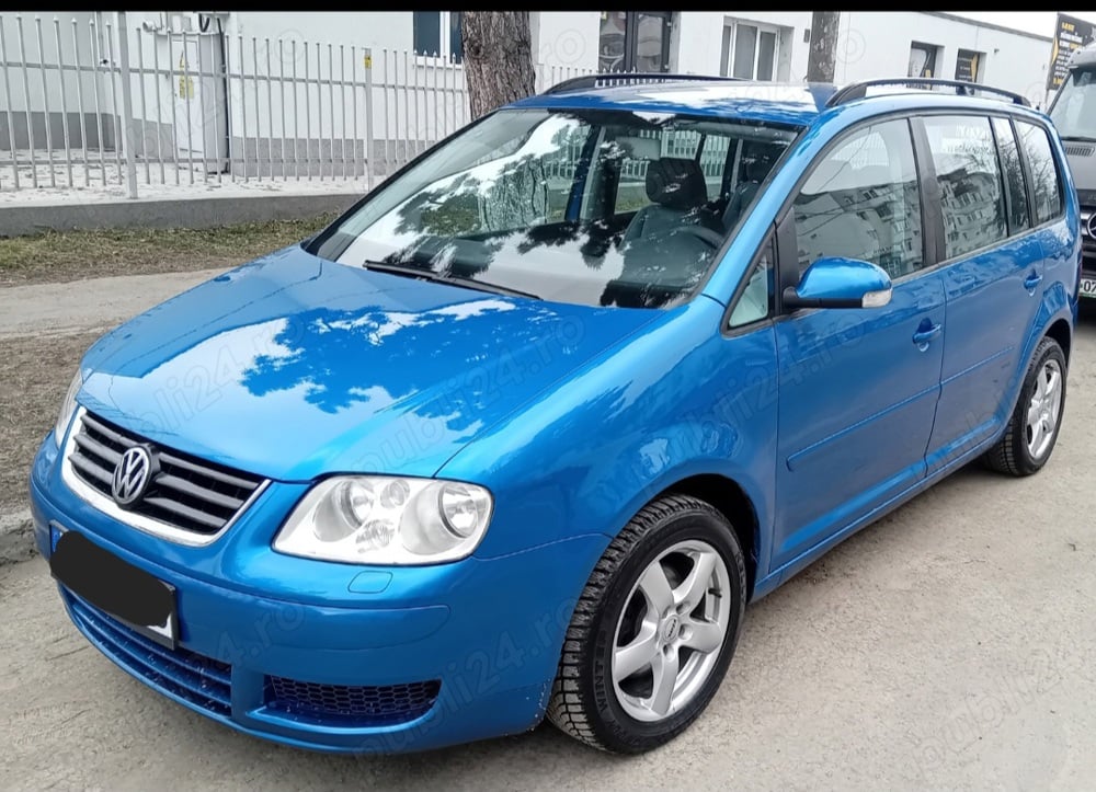 Touran, 7 locuri 1.9 tdi