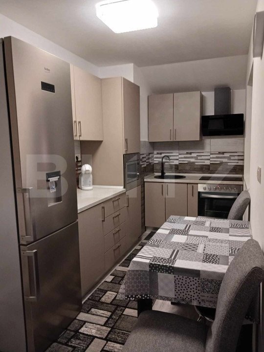 O locuință versatilă, cu două apartamente independente, Zona  Fabric