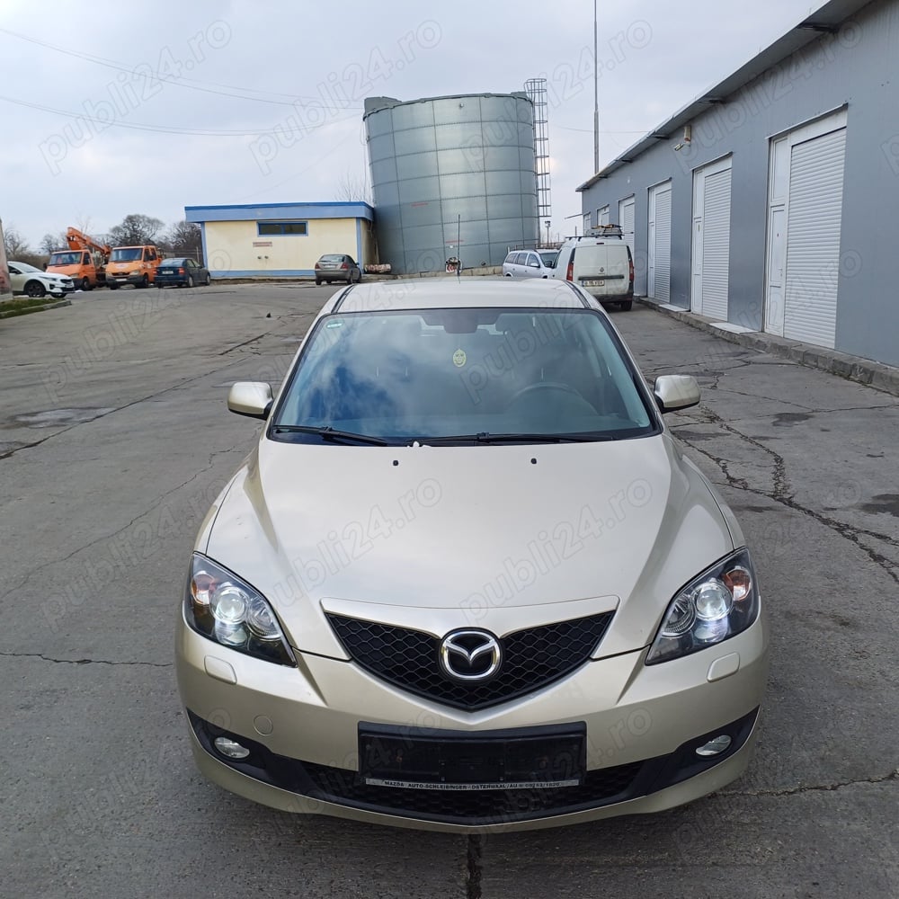 Mazda 3 ,1.6 benzina 105 cai ,clima,incalzire scaune,xenon Import Germania