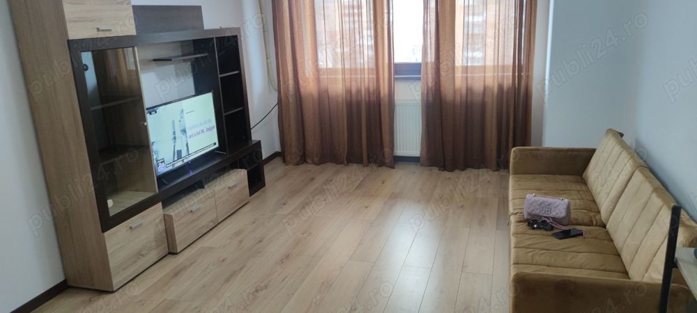 Închiriez apartament 2 camere cu loc de parcare privat