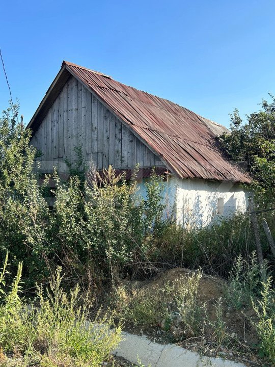 Casa si terenuri in suprafata de 7.600 mp