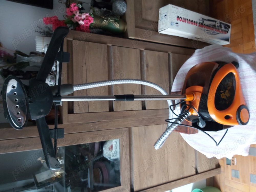 Aparat de calcat cu aburi vertical