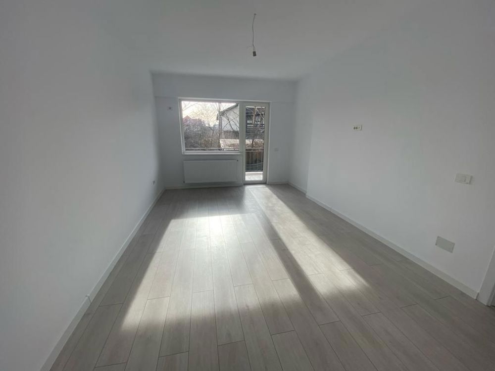 Apartament 2 camere, decomandat, 63,59 mp, 2 băi, parcare disponibilă