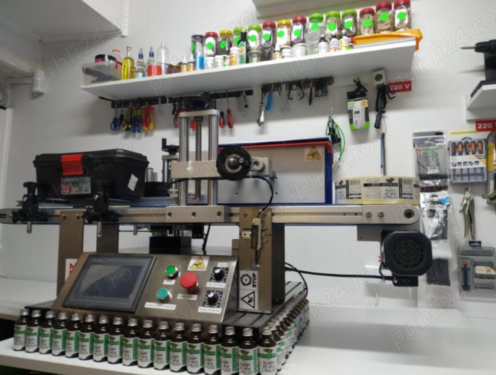 Masina etichetare recipiente cilindrice din sticla