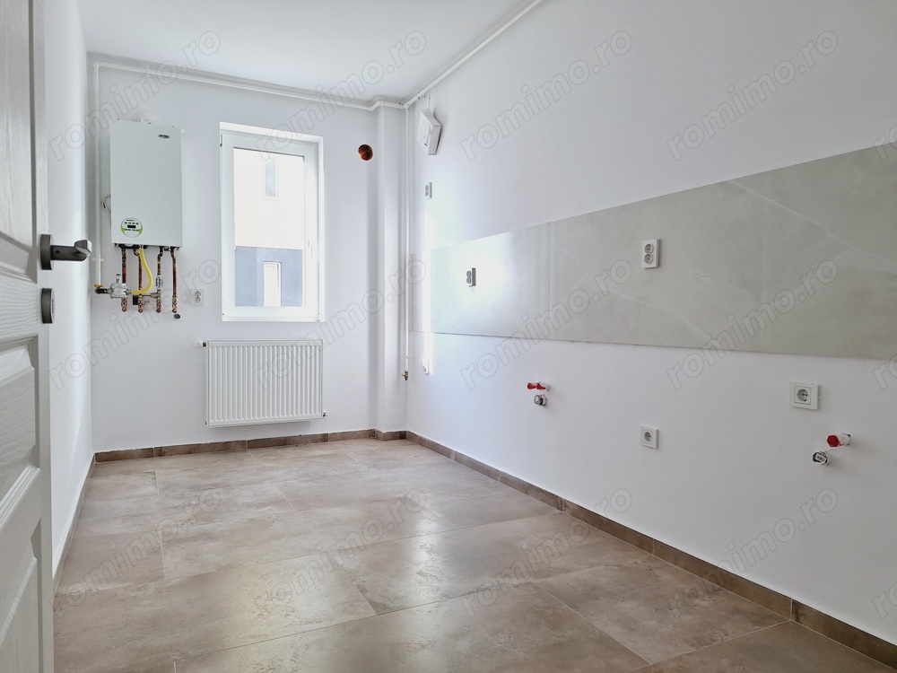 Spatios, 55 mp utili. Etajul 1. Bucatarie inchisa.