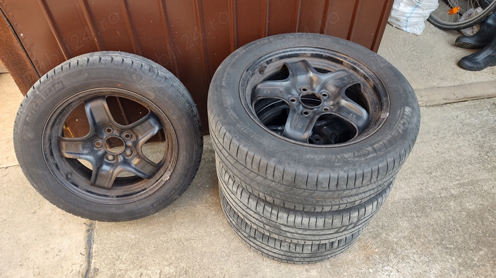 Vând 4 cauciucuri cu genti pentru Opel Astra H 205/55 r16 Michelin 