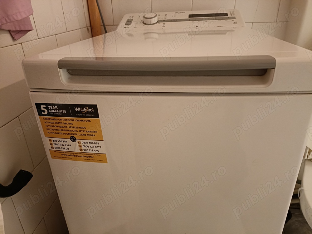 masina de spalat rufe verticala marca Whirpool