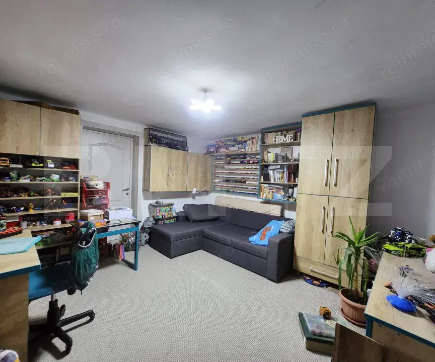 Casa cu 3 camere, 2 bucatarii, Teren de 1000 mp, zona Unirii