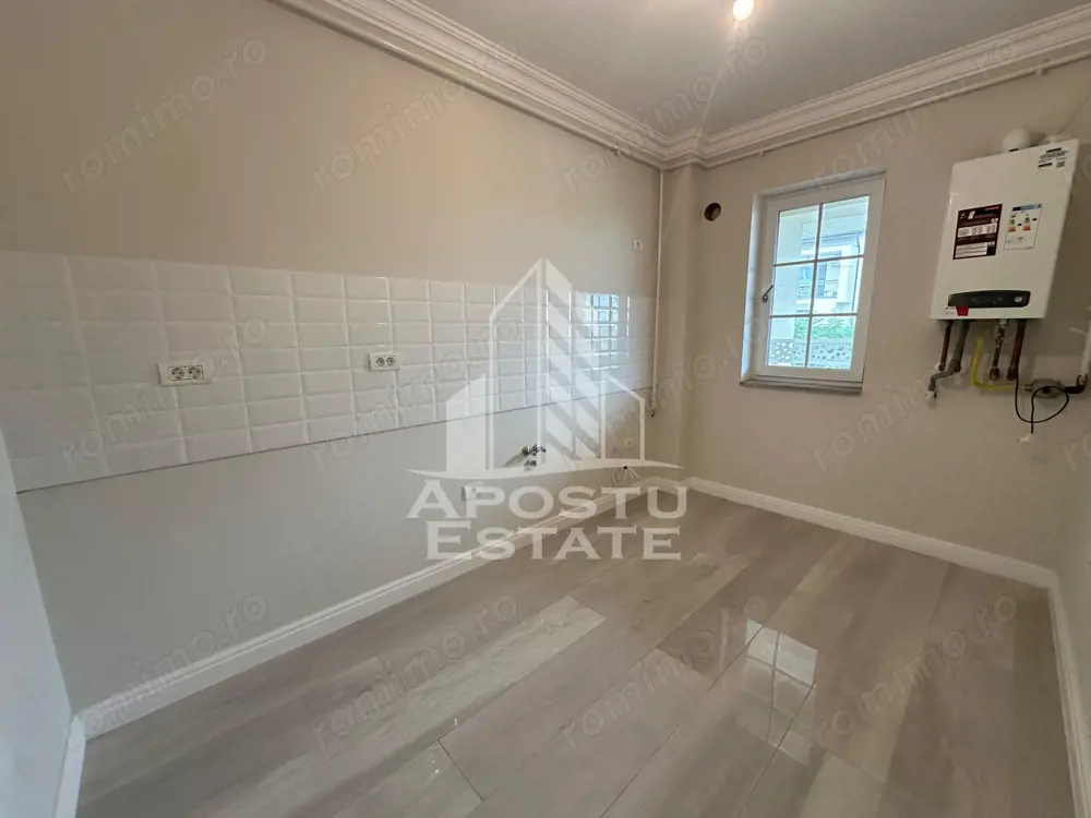 Apartament cu 2 camere si curte bucatarie separata in Giroc la asfalt