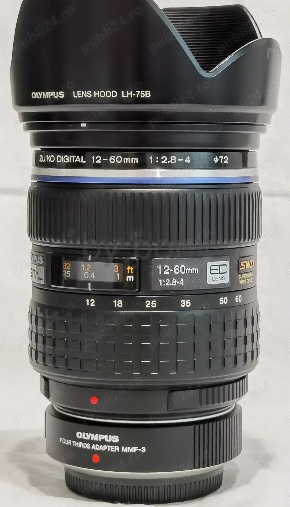 Obiectiv foto (profi) Olympus 12-60mm F2.8-4, 4 3+Adaptor Olympus MMF-3,stare f. buna
