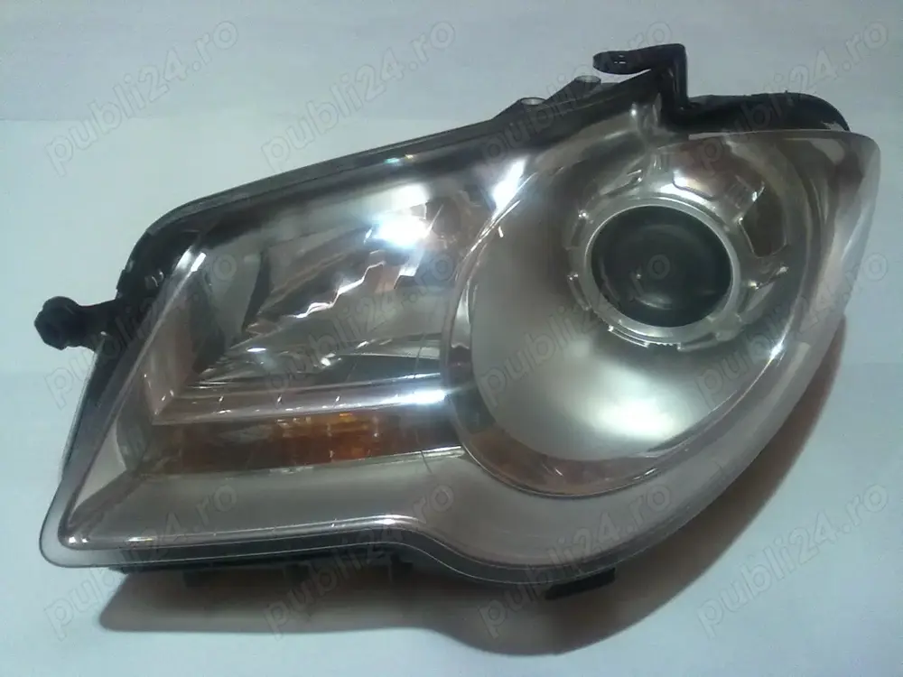 Far stanga original VW Touran facelift 2006-2010