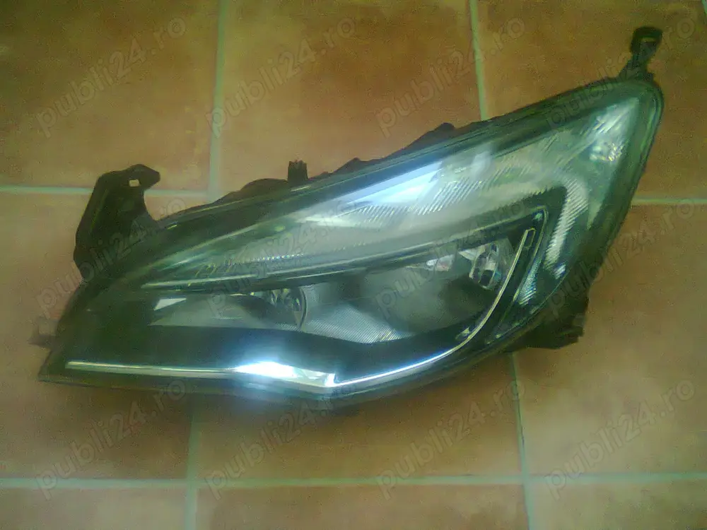 Faruri originale Opel Astra J(2009-2015)1LG010011-69HELLA