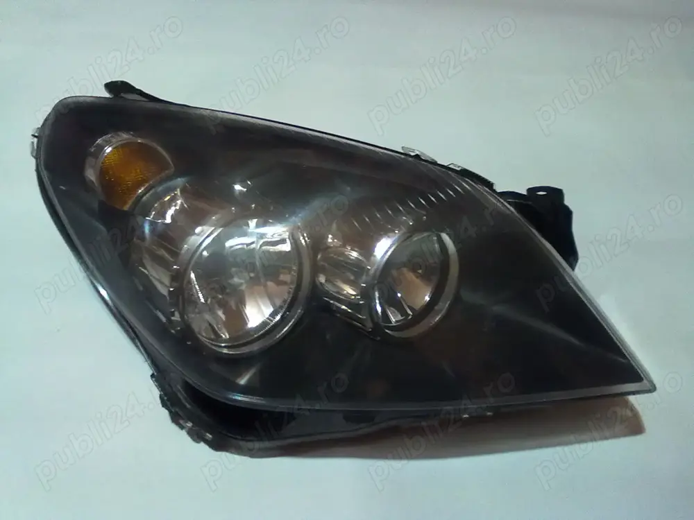 Faruri originale pe fond negru Opel Astra H - HELLA(2004-2014)