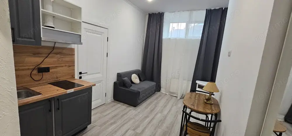 garsoniera complet mobilata situata la 5 minute de mers pe jos de Colegiul National 'Mihai Eminescu'