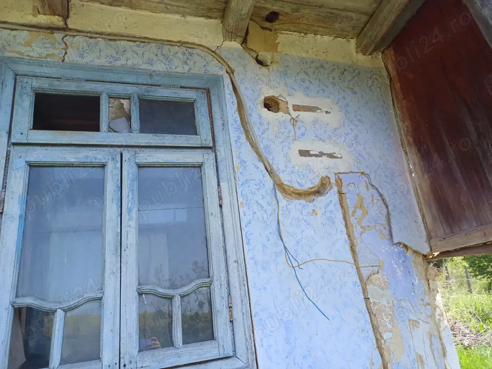 casa batraneasca cu teren intravilan 