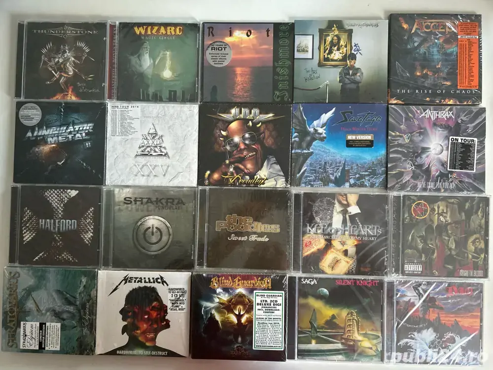 Vand cd-uri audio originale, sigilate, cu muzica rock si metal