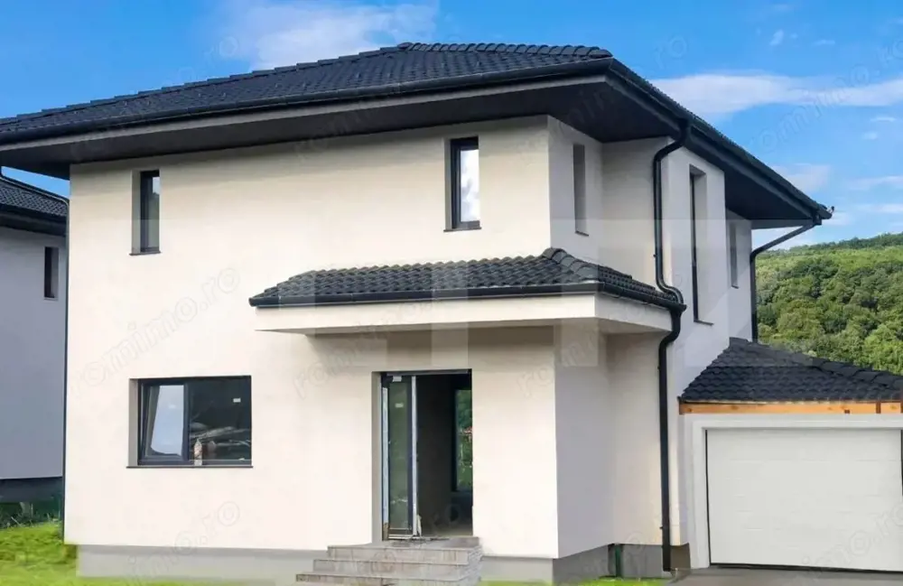 Casă individuală cu 5 camere, teren generos și garaj