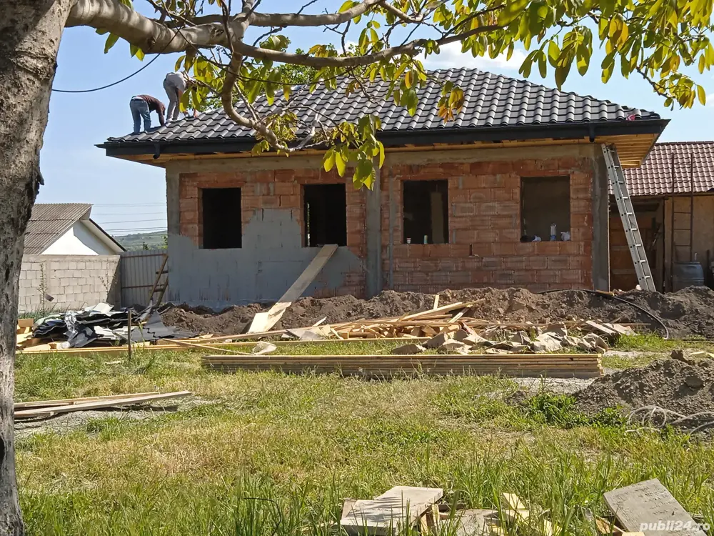 teren cu casă in constructie